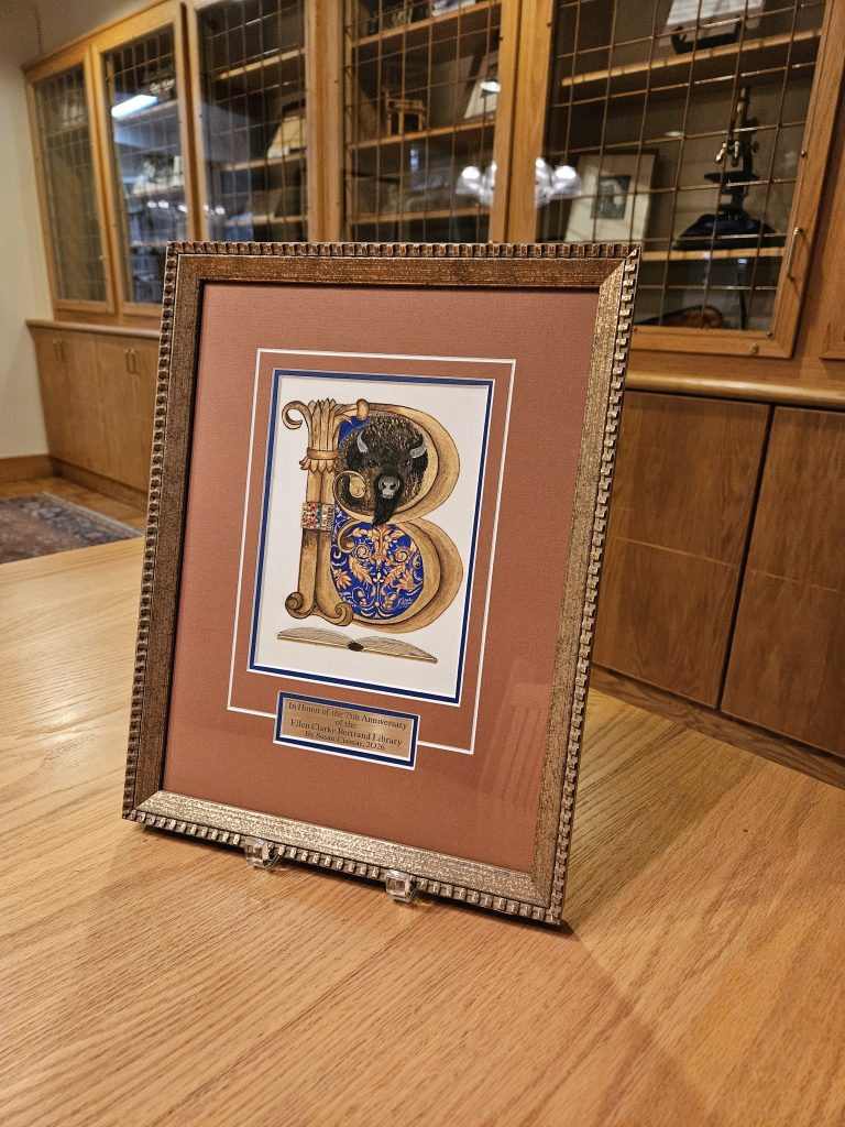 The illumination in a frame, showing the intricatly detailed B with a Bucknell bison inside.